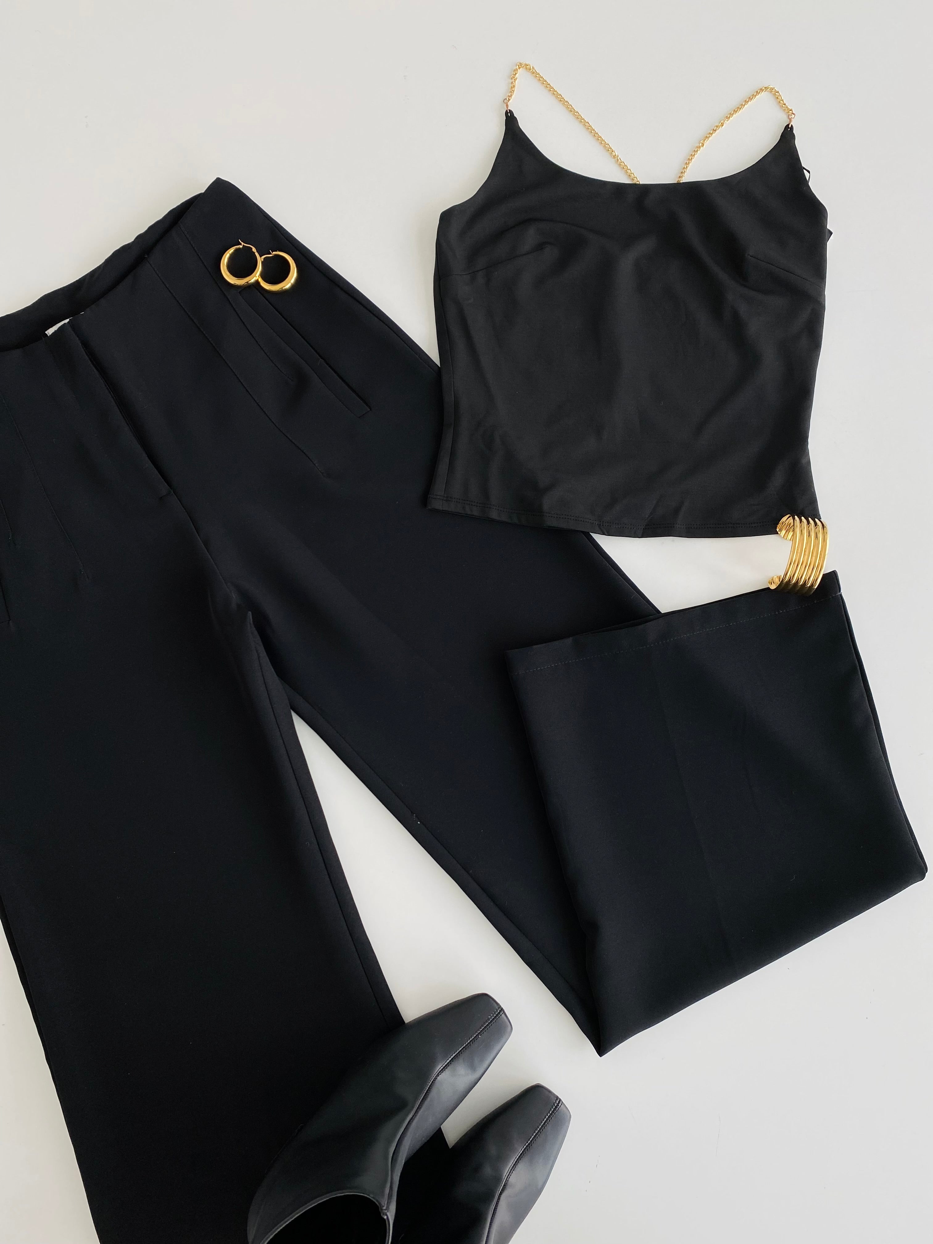 Blusa con detalle dorado