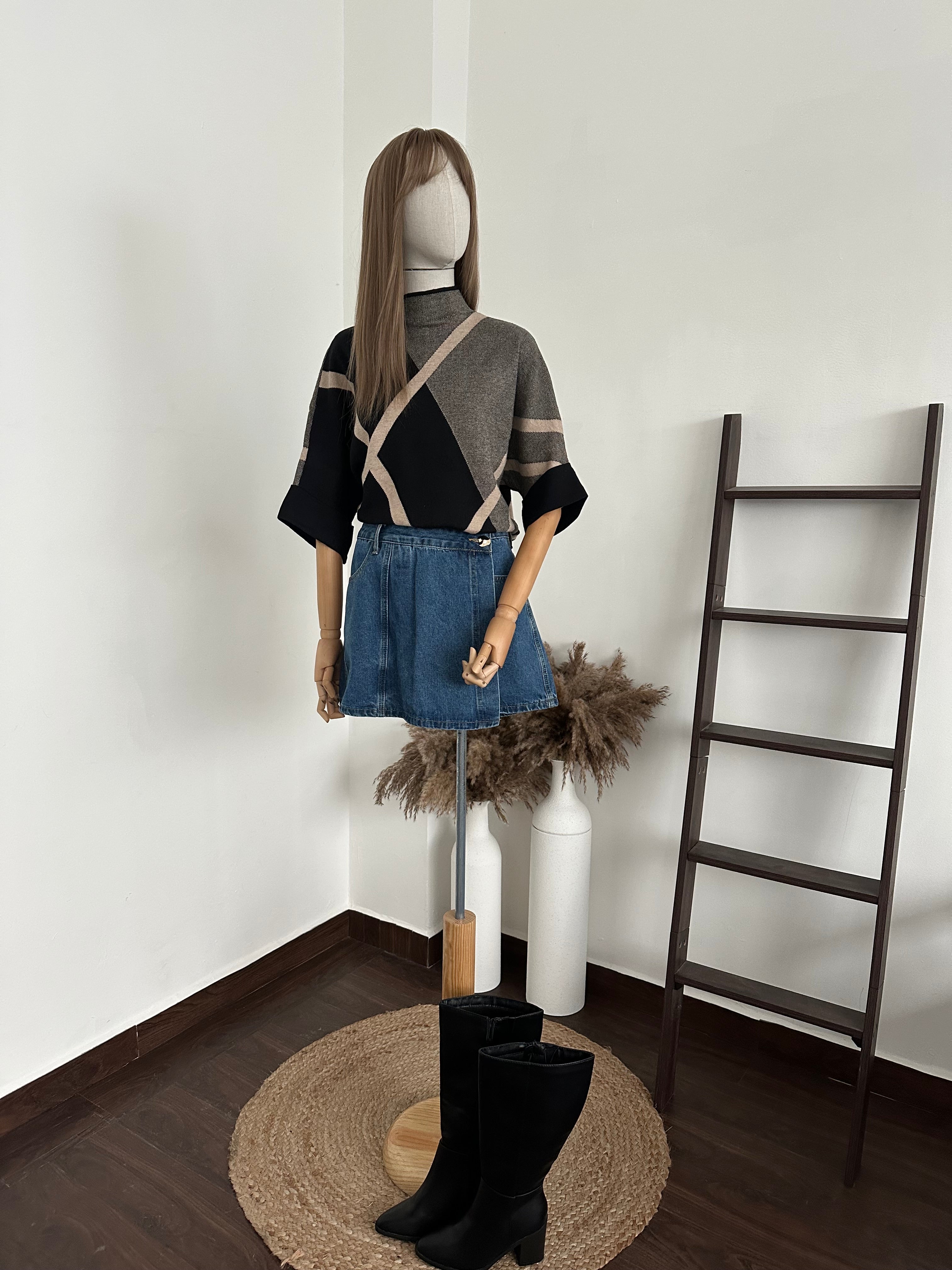 Short falda con botón