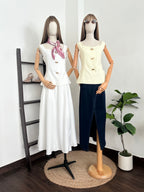 Blusa tres botones dorados
