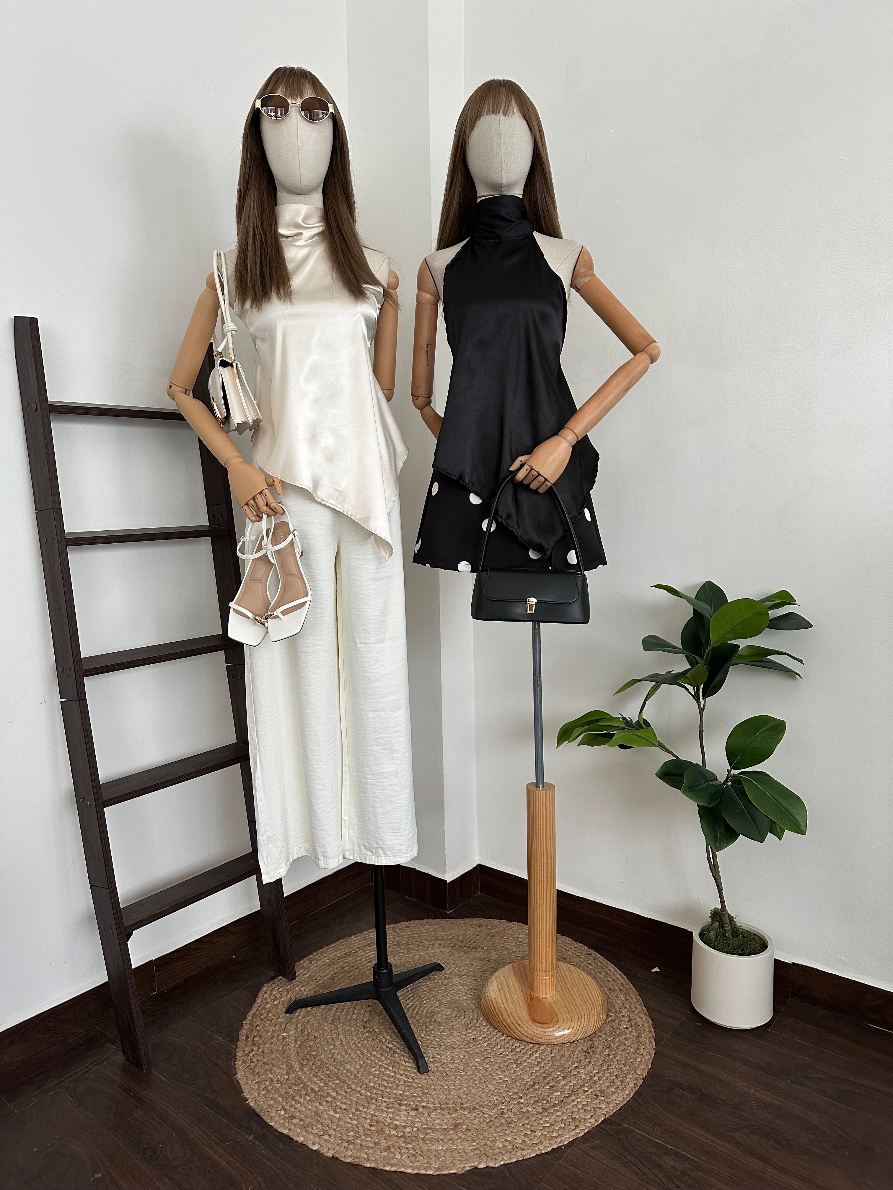 Blusa Halter satinada asimétrica