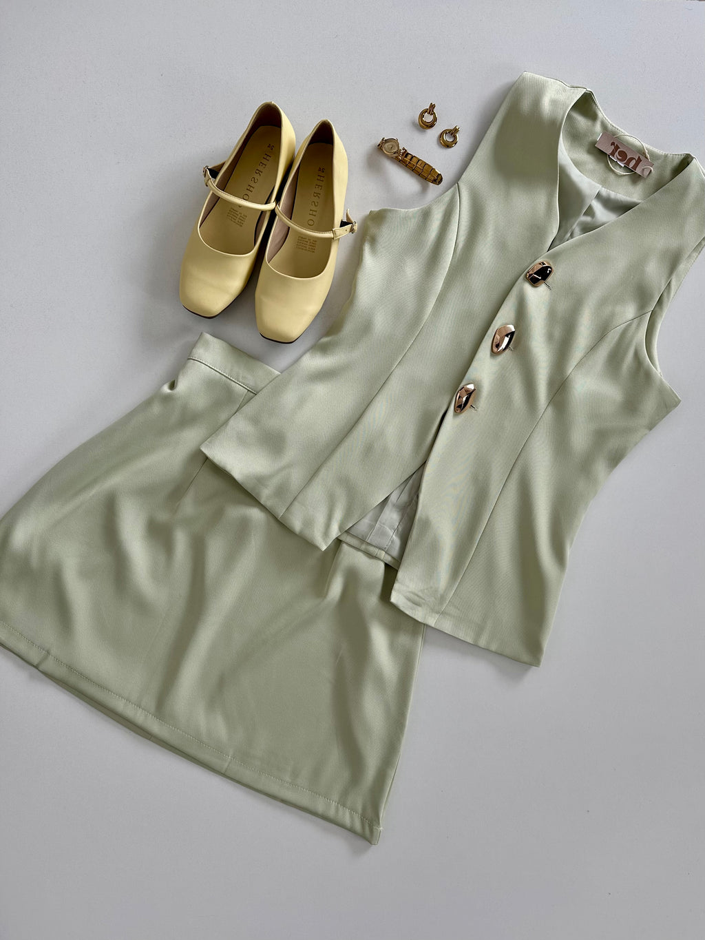 Conjunto falda y chaleco