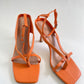 Orange strappy heels