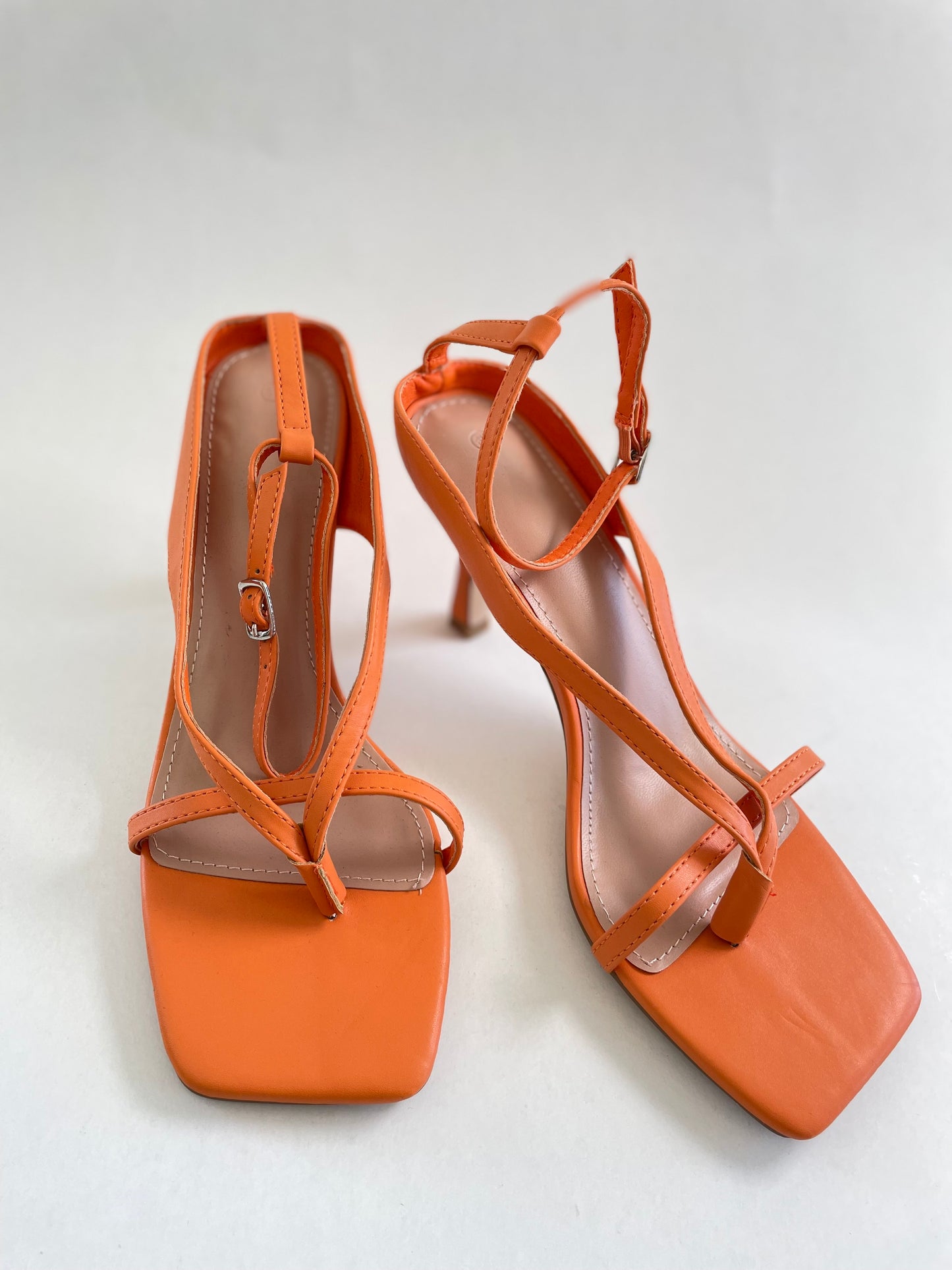 Orange strappy heels