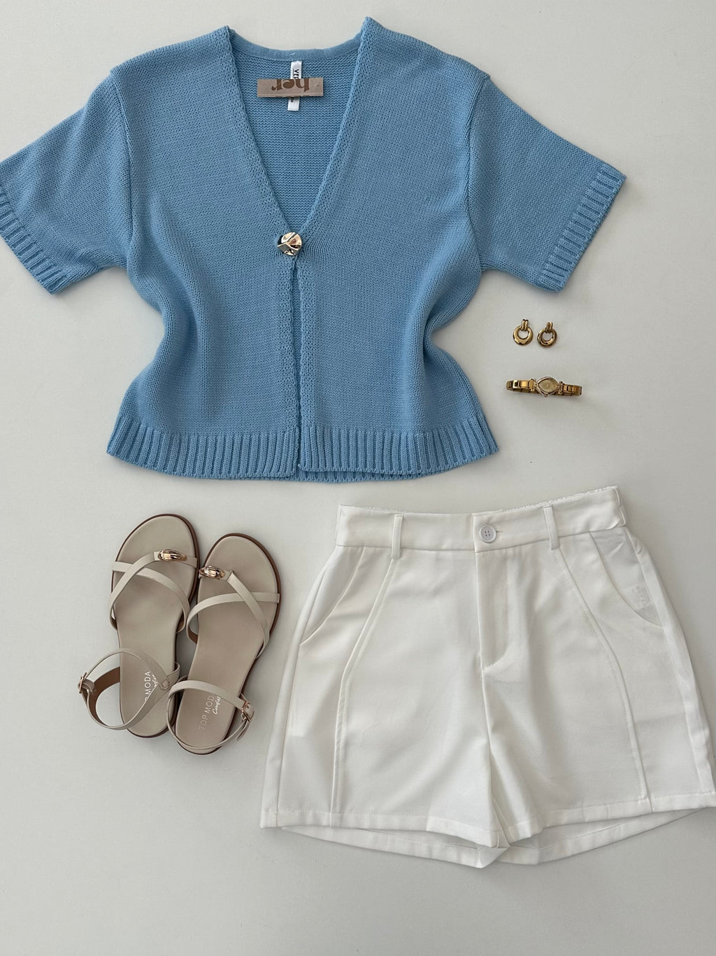 Blusa tipo capa