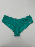 Tanga con detalle dorado
