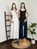 Blusa tres botones dorados