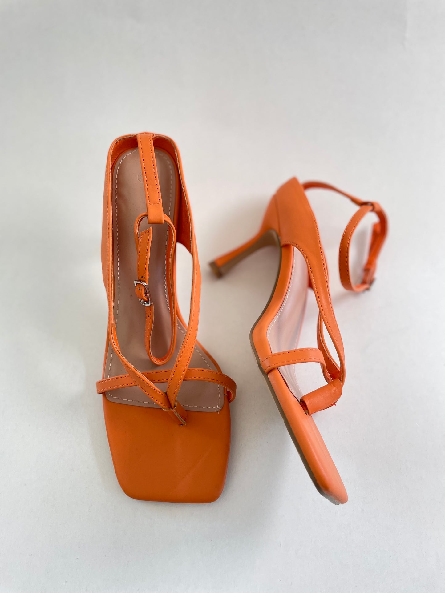 Orange strappy heels