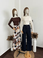 Blusa asimétrica manga larga