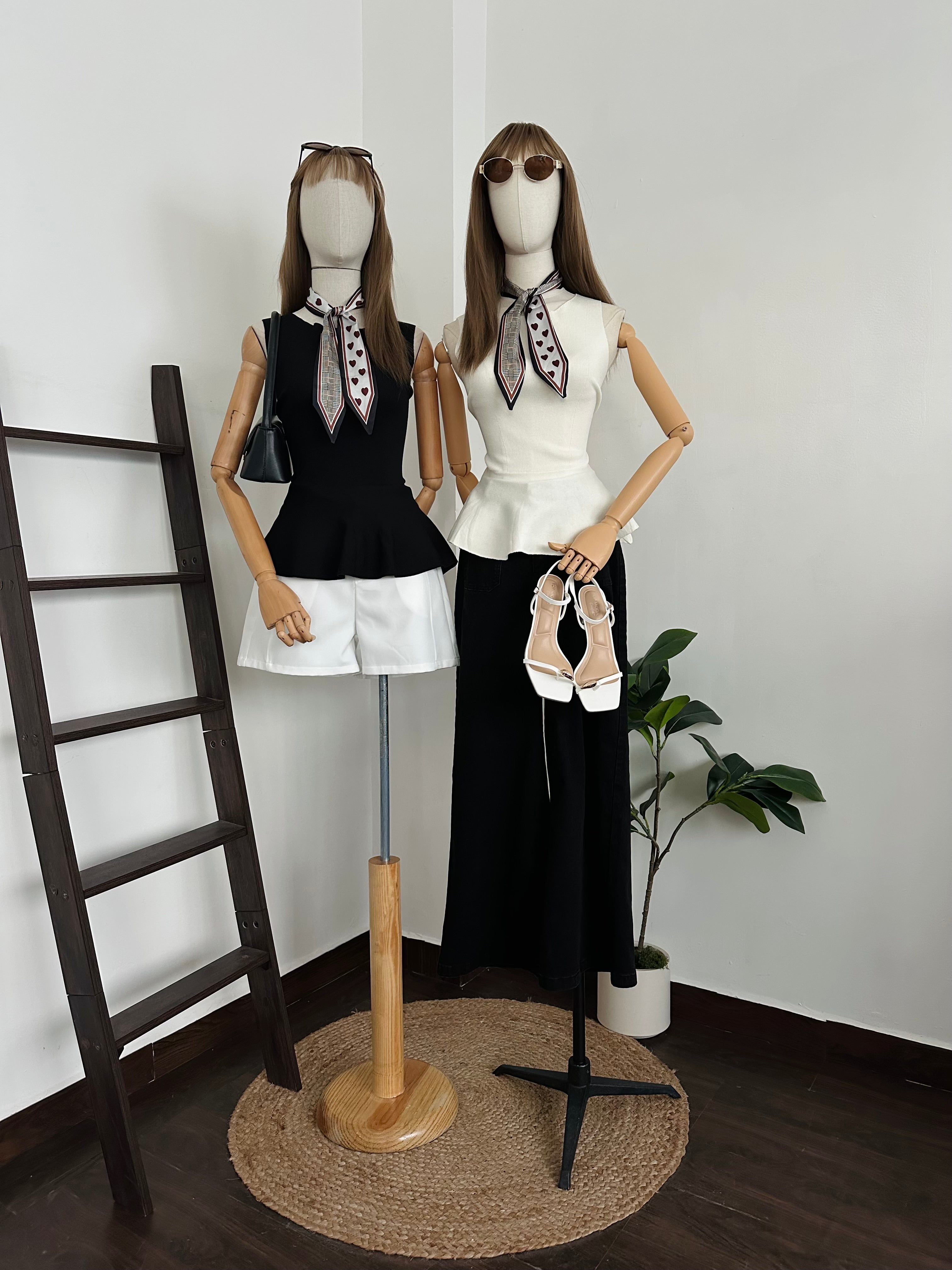 Blusa peplum de punto