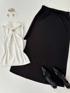 Blusa con detalle dorado