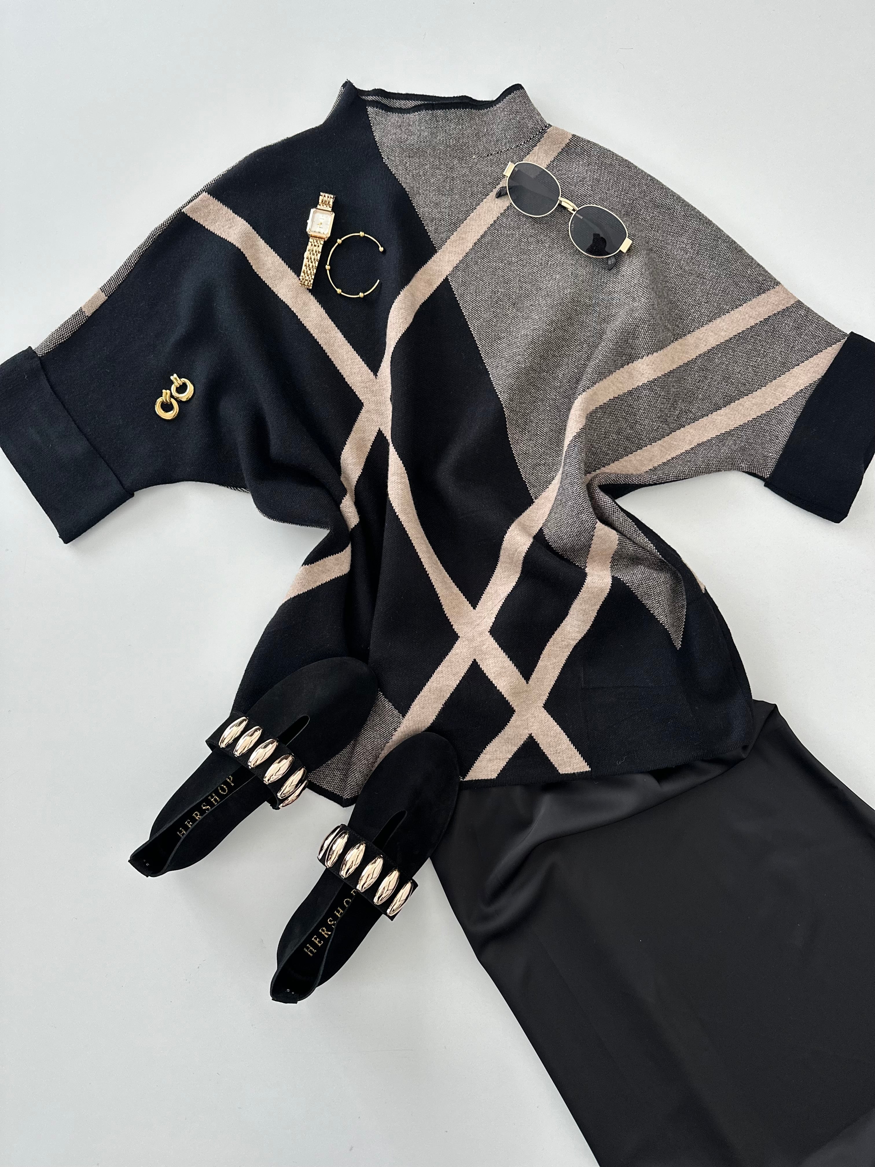 Blusa estilo capa