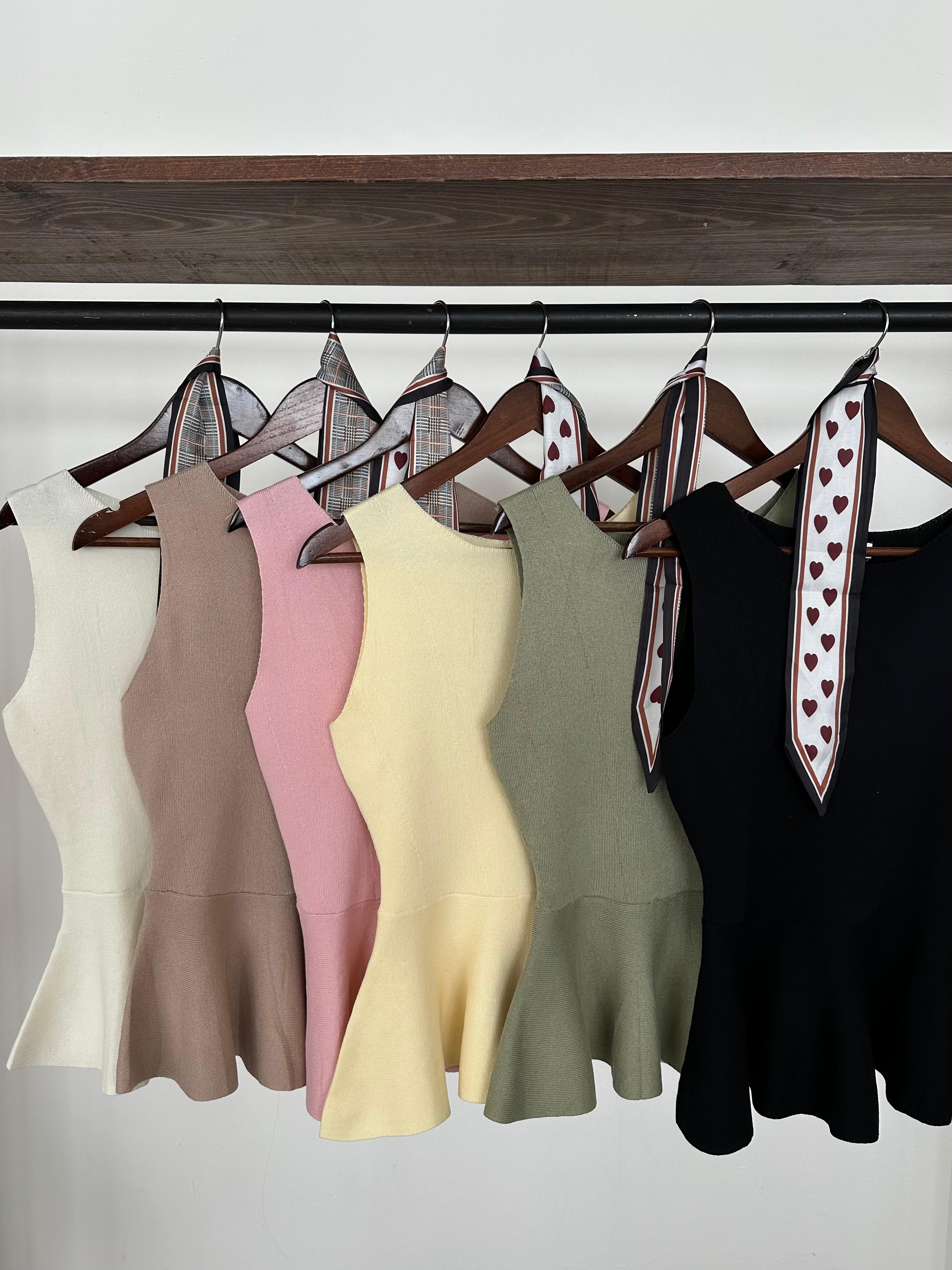 Blusa peplum de punto